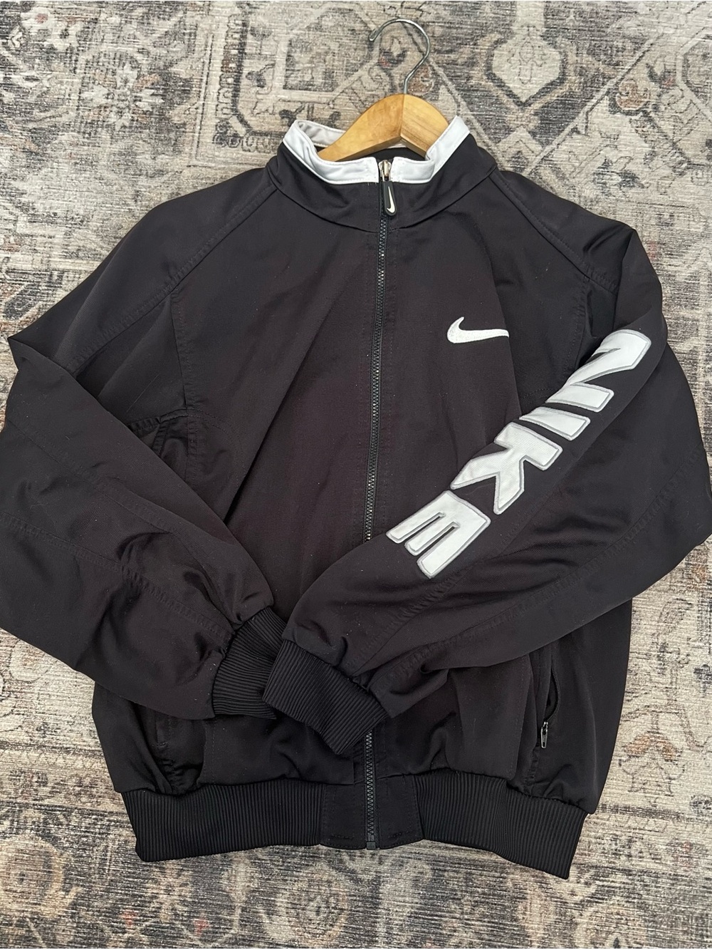 Nike Black Jacket with White Swoosh and Sleeve Lettering